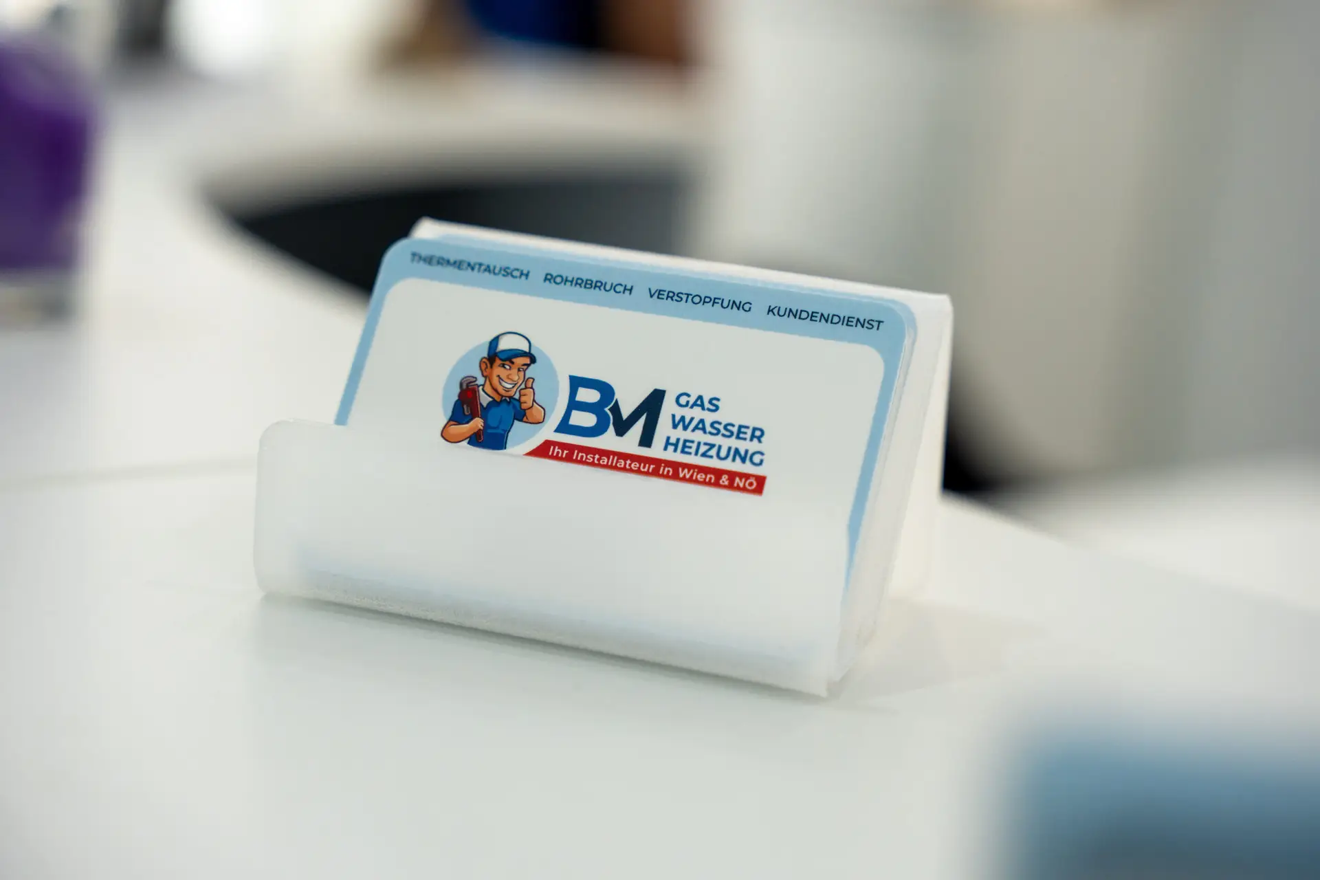 Visitenkarten von BM Gas Wasser Heizung mit dem gestalteten Firmenlogo.